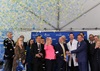 uci health fountain valley leadership cut the ribbon marking the uci health acquisition of four community hospitals while blue and yellow confetti rains down