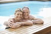 Middle-aged couple in a pool
